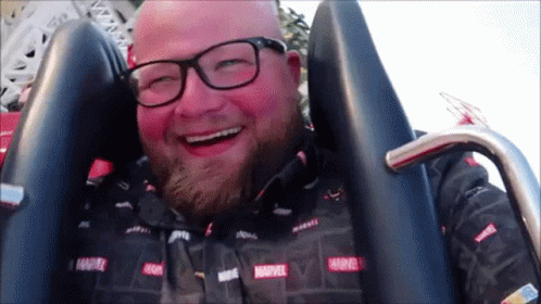 Man in Marvel Shirt Smiling
