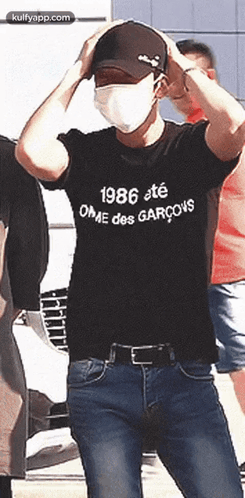 Man In Mask And 1986 T-Shirt GIF