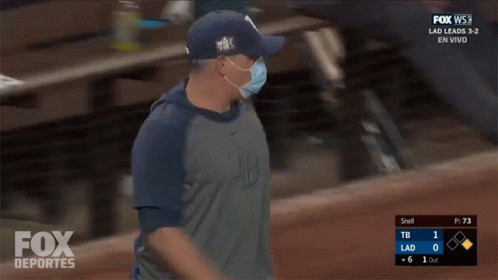 Man in Mask and Fox Deportes Shirt