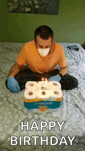 Man In Mask And Gloves Celebrating Birthday With Toilet Paper GIF