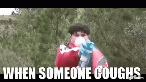 Man In Mask And Gloves Pointing Gun GIF