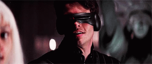 Man In Mask And Headphones Looking At Woman GIF