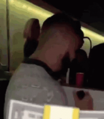 Man In Mask And Sunglasses On Race Track GIF