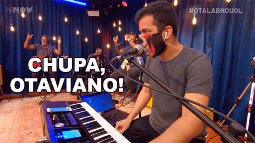Man In Mask Playing Keyboard Singing Chupa Otaviano GIF