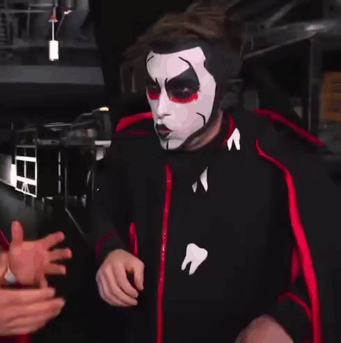 Man in Mask with A and Man in Cape