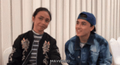 Man In Mayvrado Hat Sitting With Woman GIF