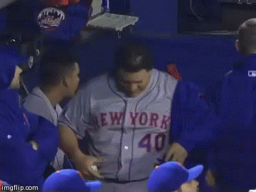 Man in Mets Jersey Shaking Hands