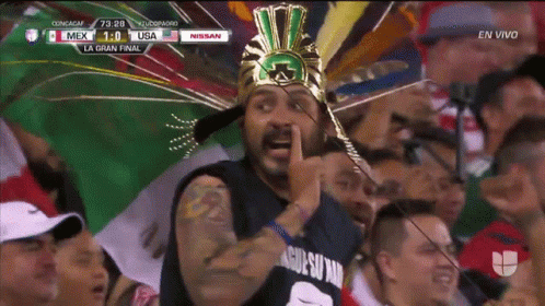 Man in Mexican Headdress and Nissan Shirt