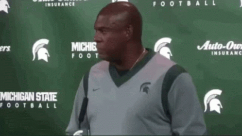 Man in Michigan State Football Jersey