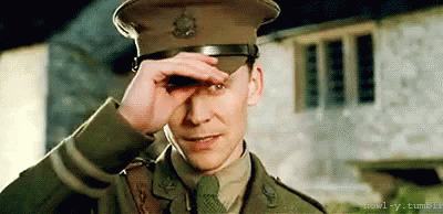 Man In Military Uniform Covering Eyes GIF