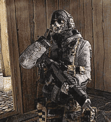 Man In Military Uniform Holding Gun GIF