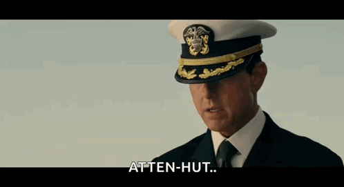 Man in Military Uniform Saluting Atten-Hut