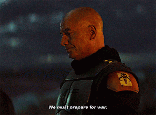 Man in Military Uniform Saying We Must Prepare for War