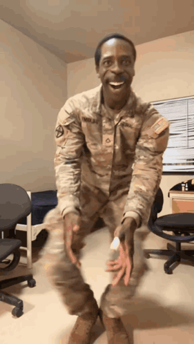 Man In Military Uniform Smiling GIF