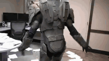 Man In Military Uniform Standing In Room GIF