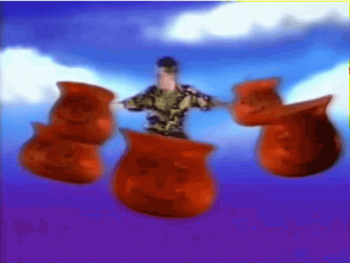 Man In Military Uniform Surrounded By Red Gummy Bears GIF