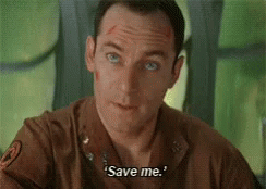 Man In Military Uniform Talking At Table GIF