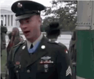 Man In Military Uniform Talking In Front Of White House GIF