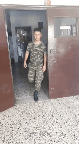 Man in Military Uniform Walking Out Door Saying Awesome