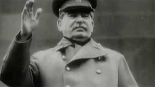 Man in Military Uniform Waving