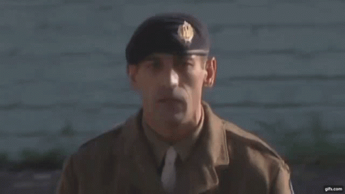 Man in Military Uniform with Beret