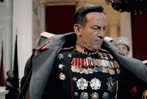 Man In Military Uniform With Medals GIF