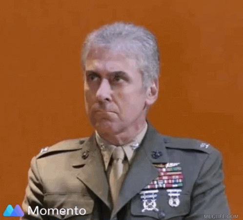 Man In Military Uniform With Momento GIF