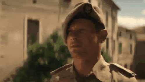 Man in Military Uniform With U.S. Army Badge