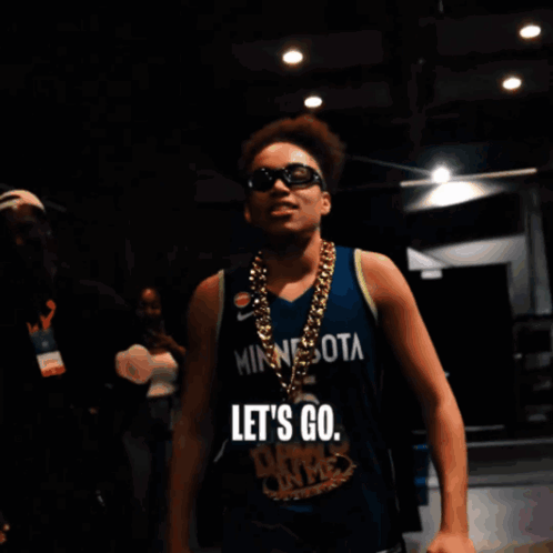 Man In Minnesota Jersey And Sunglasses Says Let's Go GIF