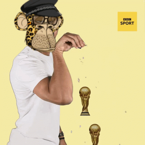 Man in Monkey Mask Holding Trophy BBC Sport