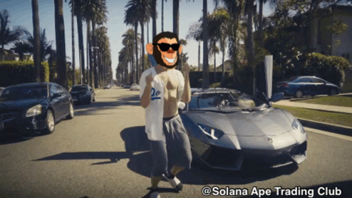 Man in Monkey Mask in Front of Car Solana Ape Trading Club