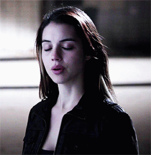 Man In Myka Shirt Lying On Bed GIF