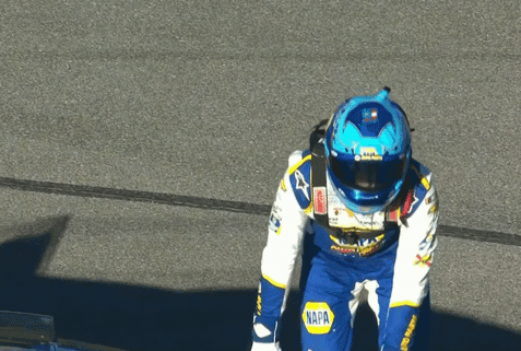 Man in Napa Helmet on Race Track