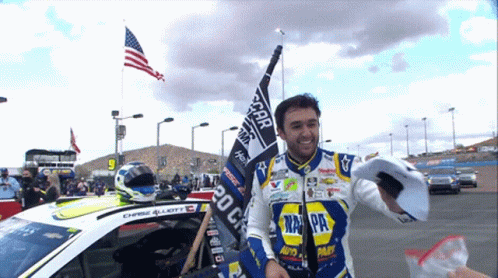 Man in Napa Jacket Holding Flag