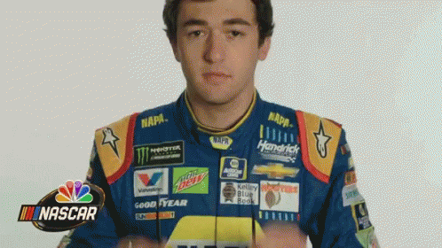 Man in NAPA Racing Jacket Thumbs Up