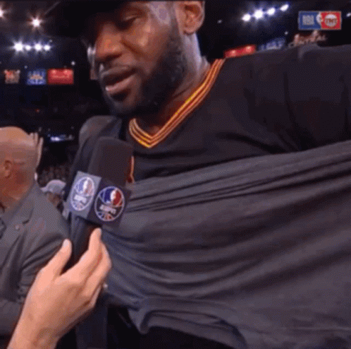 Man in NBA Jersey Being Interviewed