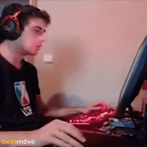 Man In NBA Shirt And Headphones Playing Video Game GIF