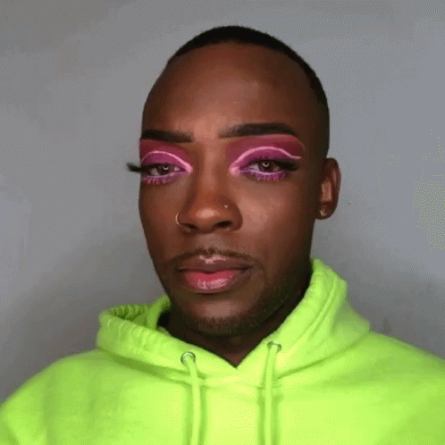 Man in Neon Green Hoodie With Pink Eyeshadow
