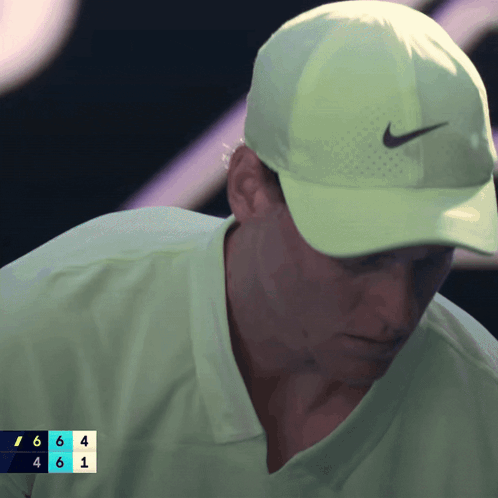 Man In Neon Green Nike Hat GIF