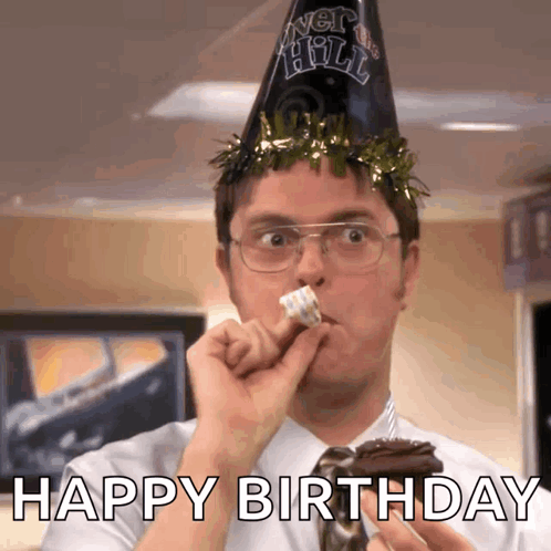 Man In New Year's Eve Hat Eating Cake GIF