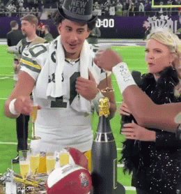 Man In New Year's Hat Standing On Football Field GIF