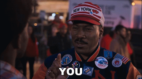Man in New York Hat and Jacket Saying You