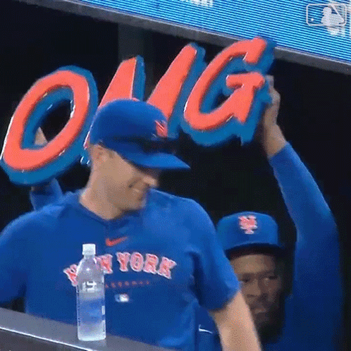 Man in New York Jersey Holding Sign