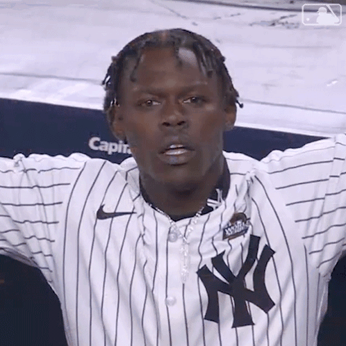 Man In New York Yankees Jersey With Arms Outstretched GIF