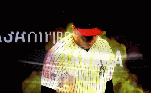 Man in New York Yankees Uniform Standing by Samurai Sign