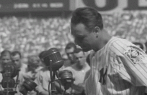 Man In New York Yankees Uniform With Microphone GIF