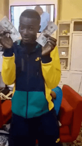 Man In Nike Jacket Holding Money GIF