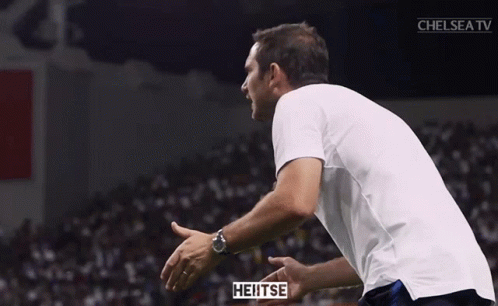 Man In Nike Jacket In Front Of Crowd GIF