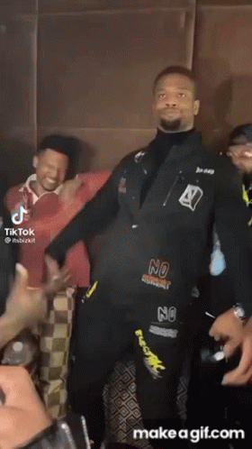 Man In No Movement Jacket Dancing With Others GIF