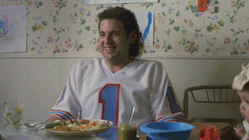 Man in Number 1 Jersey Sitting